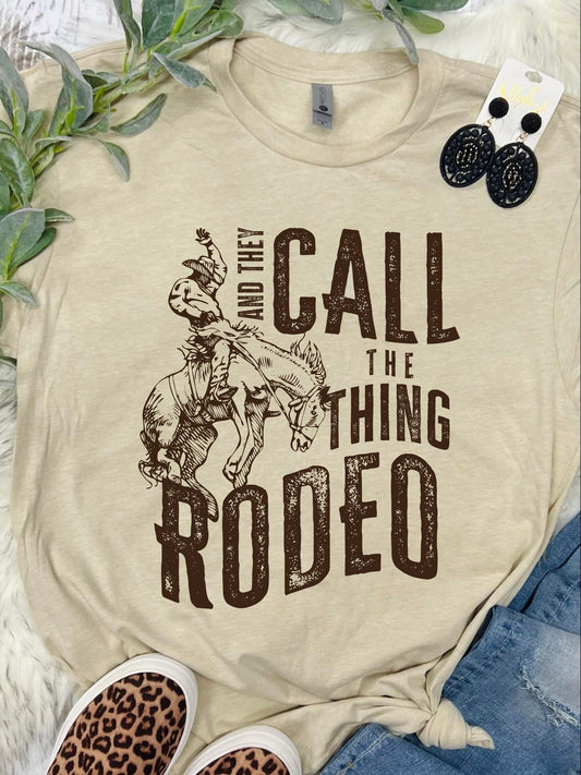 & They Call the Thing a Rodeo Tan Tee